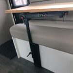nuova mapa onda wall mounted swivel table leg black anodised